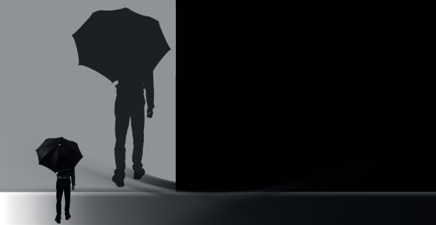 一个男人在墙上秘密地想象自己的单色场景。图片下载