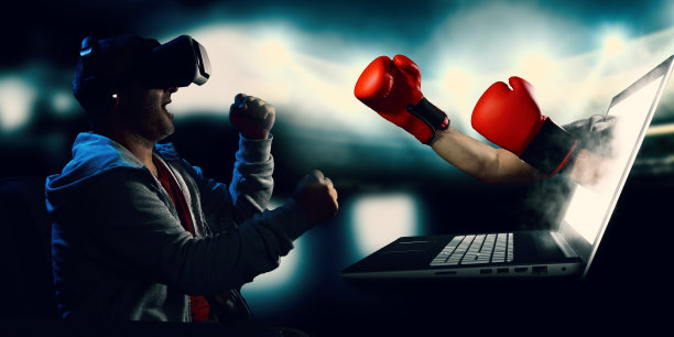 玩虚拟拳击运动游戏的年轻人图片下载