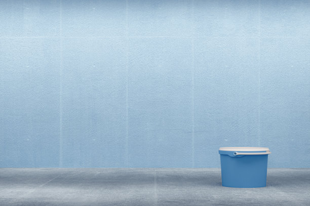 蓝色的混凝土墙和油漆罐图片下载
