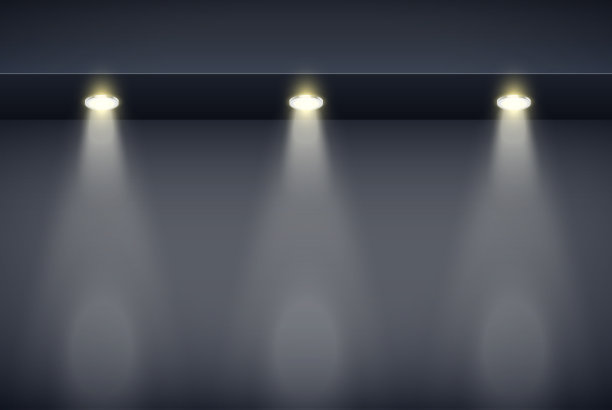 带聚光灯的黑色墙壁上的边框图片下载