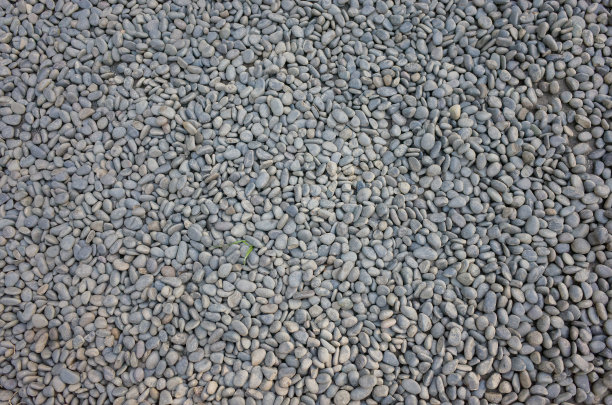 巨石卵石海滩石头背景无缝瓷砖纹理。图片下载