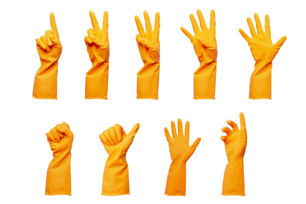 一套保护橙色橡胶手套隔离在白色背景。图片下载