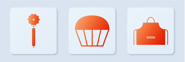 将松饼披萨刀和厨房围裙摆成白色图片下载