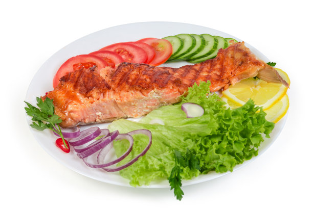 一份烤鳟鱼片夹在蔬菜和青菜中图片下载