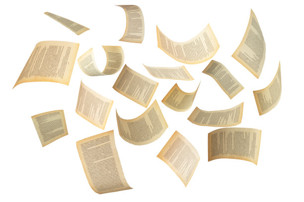 许多飞翔的书页孤立在白色的背景上。抽象和创造性的照片编辑。图片下载