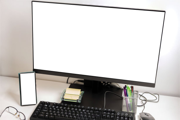 近宏的电脑显示器和手机与模型图像空白屏幕。图片下载