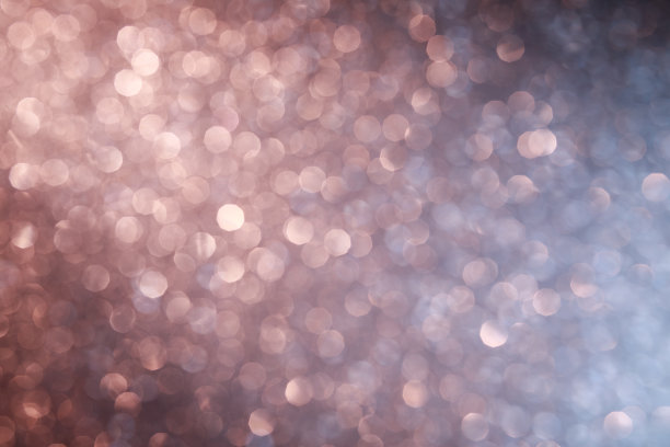 粉色闪光纹理抽象背景。散焦散景。图片下载