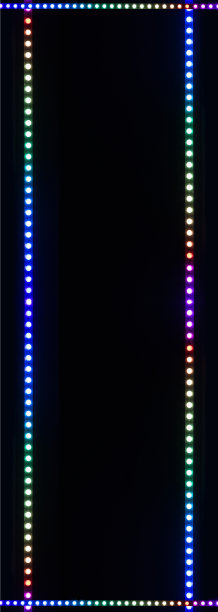 五彩缤纷的照明框架，花环灯，节日装饰，黑色背景墙纸，海报图案，垂直图片与空白的复制空间为您的文字这里图片下载