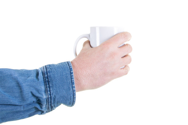 手的男人杯子咖啡孤立在一个白色的背景图片下载
