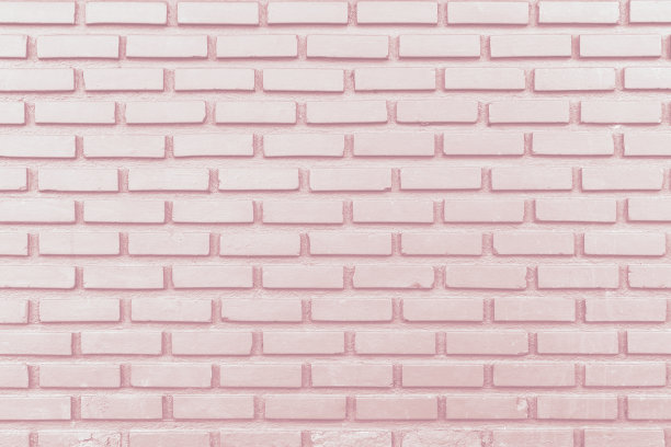 米色砖墙纹理背景。图片下载