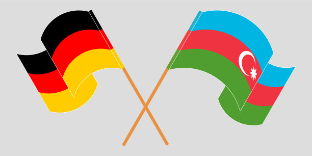 交叉挥舞着阿塞拜疆和德国国旗图片下载