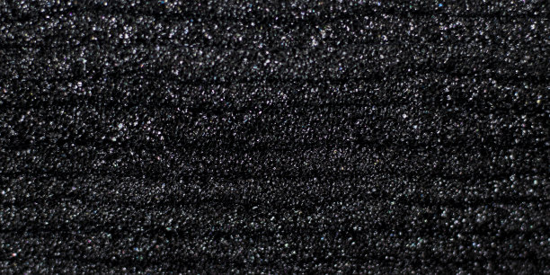 黑色塑料材料与水平线。背景或纹理图片下载