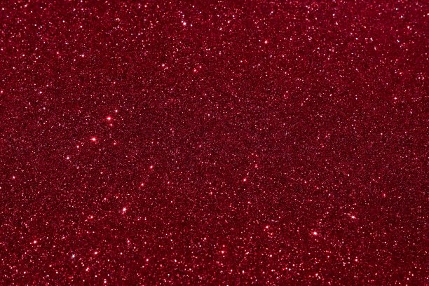 闪闪发光的背景红色。圣诞，节日抽象背景与复制空间。图片下载
