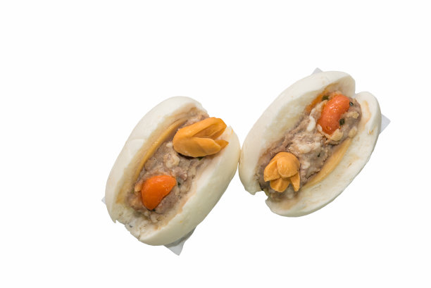 以猪肉为馅的蒸饺，配以鸡蛋和猪肉香肠图片下载