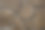 抽象纹理的棕色石头的不确定形式铺在墙上图片下载