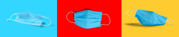医用口罩的不同颜色的背景。病毒、流感、冠状病毒流行、COVID - 19大流行、细菌、感染和肺炎保护概念照片。图片下载