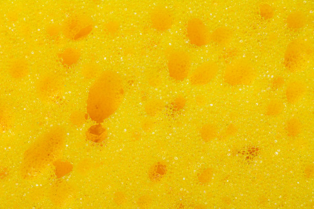 特写黄色海绵，特写摄影，黄色纹理。图片下载