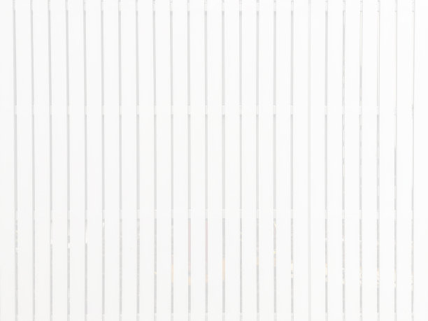 白色纹理图案抽象的背景和文本复制空间。背景卷帘门纹理。图片下载