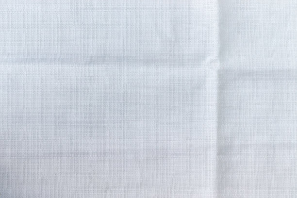 天然白色亚麻织物质地。粗糙皱巴巴的粗麻布背景图片下载