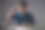 亚洲妇女在蓝色衬衫瘙痒和把一个手指放进她的耳朵在办公室。孤立在白色背景上。图片下载