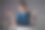 一名穿着蓝色衬衫的亚洲女性在办公室用笔记本电脑工作，看着复印空间，感到困惑。孤立的背景。图片下载