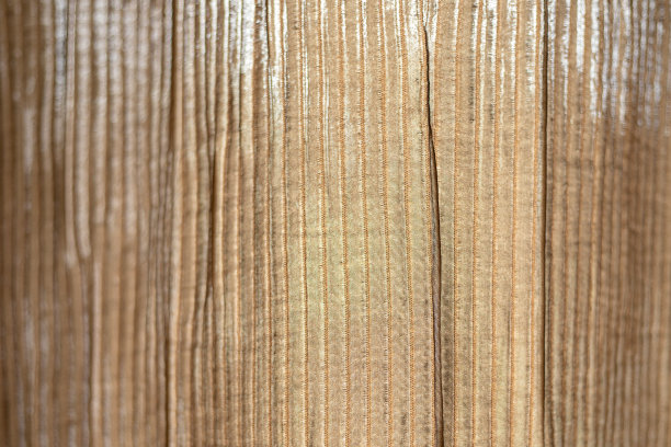 间隙条上织物的纹理。帆布被压缩或波纹。地带。特写照片。用于布料和窗帘商店，装饰材料。有选择性的重点图片下载