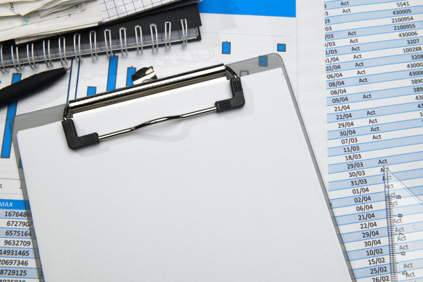 商务办公台面特写-财务报表、分析会计、套文件、图表、各种项目记帐、计算器图片下载