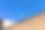 一座砖墙现代教堂屋顶上孤立的耶稣受难像(意大利佩萨罗)图片下载