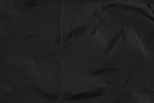 抽象的黑色合成材料褶皱和褶皱褶皱图片下载
