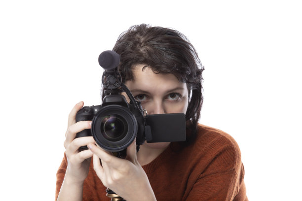 艺术学生拿着相机学习成为电影制作人图片下载