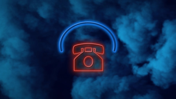 蓝色背景下霓虹灯上的电话符号图片下载