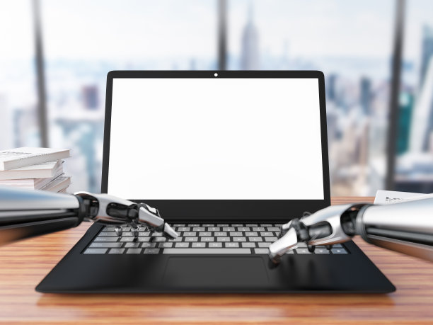 机器人的手在笔记本键盘上打字AI概念图片下载