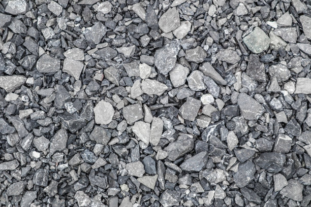 灰色的地面石，碎石的背景有许多小石块。图片下载