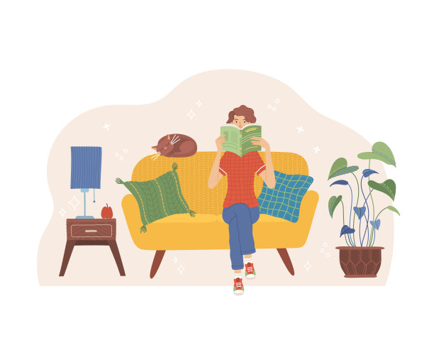 一个女人正坐在沙发上看书图片下载