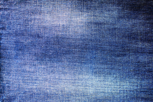 蓝色牛仔布背景，详细的纹理与vignette图片下载