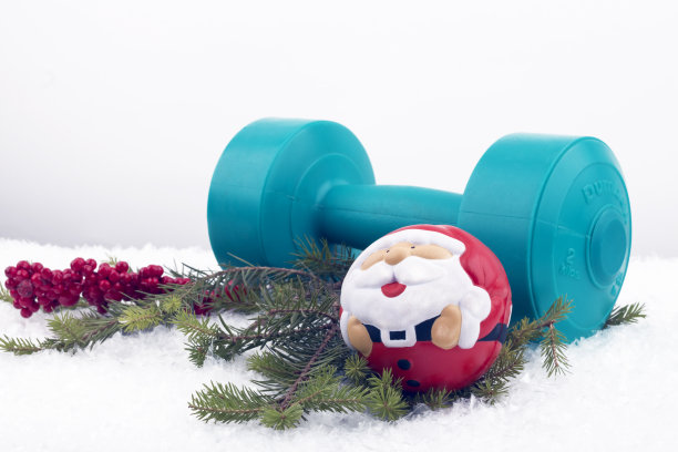 圣诞作文与哑铃和手膨胀。图片下载