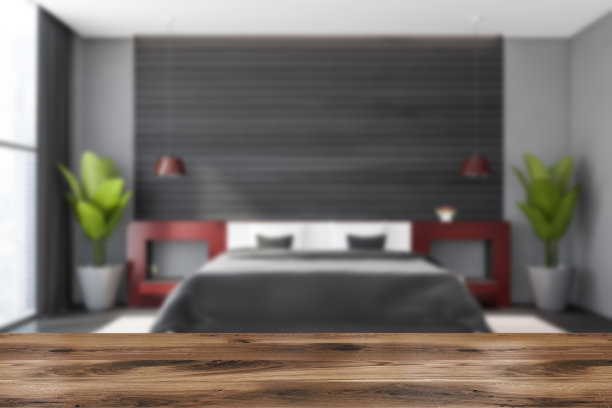 桌子在模糊的灰色和木制卧室图片下载