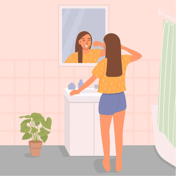 漂亮的女孩在浴室的镜子前刷牙。图片下载