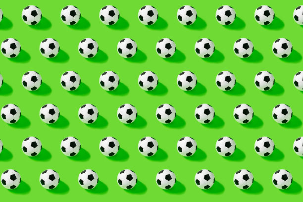 模式。绿色背景上的足球。游戏,比赛图片下载