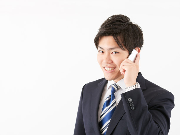 日本男商人打来电话图片下载