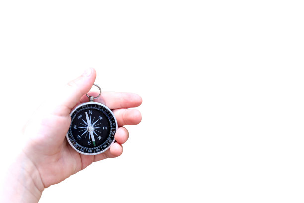 手持指南针孤立在白色背景上为抽象图像与地方为文本作为符号旅游与指南针，旅行与指南针和户外活动与指南针图片下载