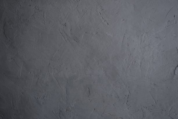 深色的水泥墙背景和纹理。复古或肮脏的背景自然水泥或石头的旧纹理作为复古图案墙。灰色混凝土的纹理。图片下载