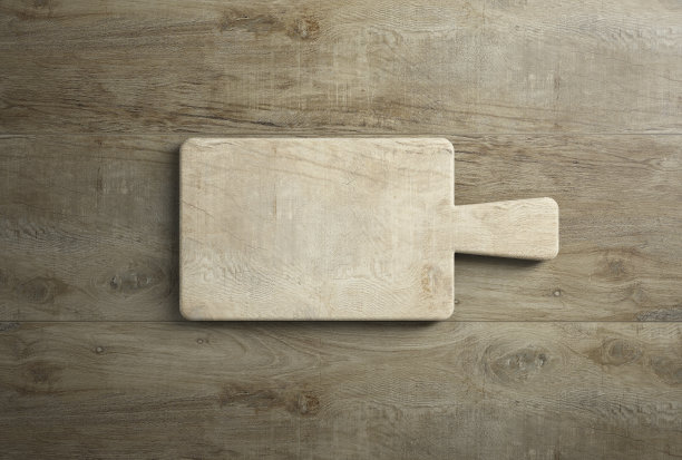 质朴的木制砧板放在桌面上作为模板图片下载