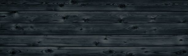 黑色木板纹理宽全景。木纹长面。黑色复古的背景图片下载