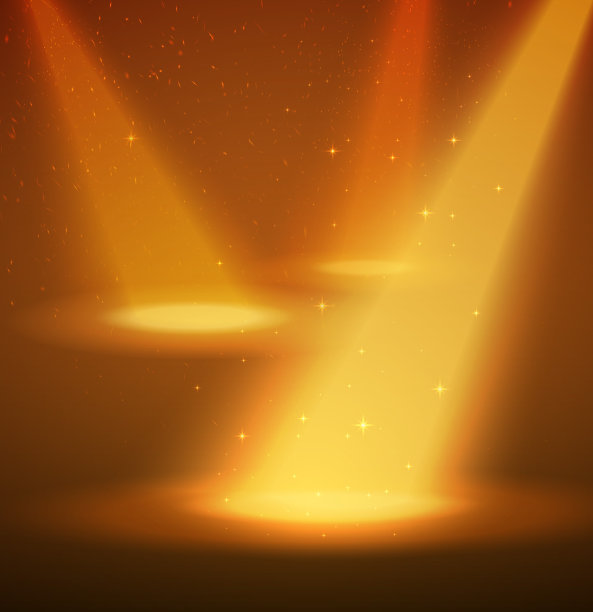 黄色聚光灯在现场。烟雾，尘埃和星星作为很好的背景。图片下载