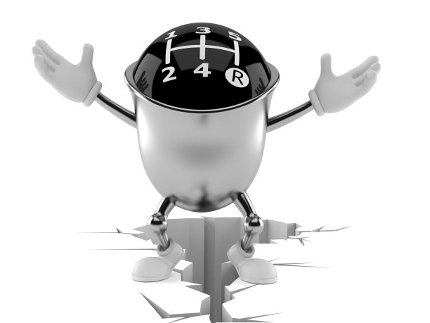 齿轮旋钮人物站在开裂的地面上图片下载