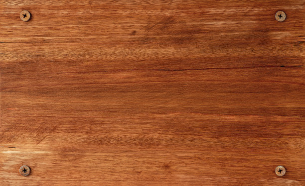 旧的，磨损的，风化的，木质柚木面板抽象背景与许多木纹纹理，四个生锈的螺栓，每个位于每个角落框架图像。图片下载