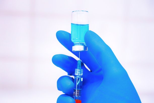 疫苗瓶剂量流感注射药物针筒注射器，医学概念接种疫苗皮下注射治疗疾病护理医院预防免疫疾病疾病婴儿儿童。蓝色背景图片图片下载