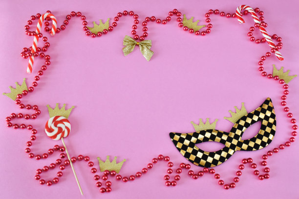 五彩缤纷的化妆舞会背景在粉红色的色调图片下载