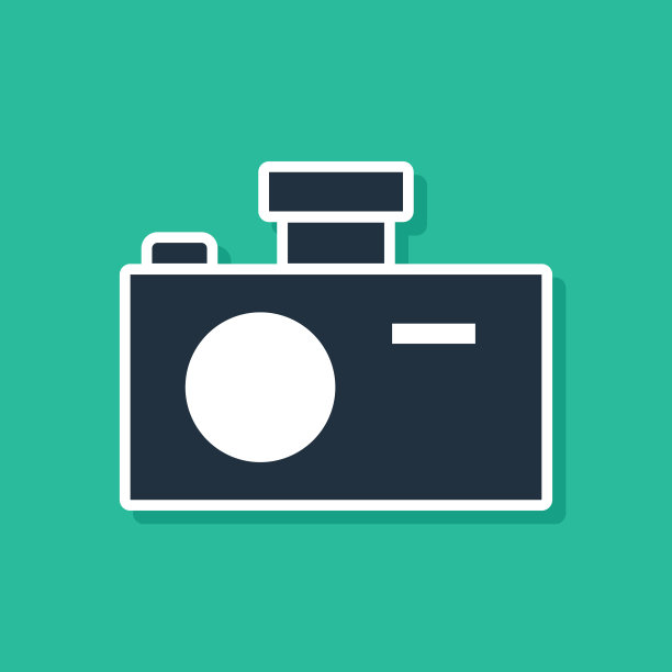 蓝色相机图标孤立在绿色上图片下载